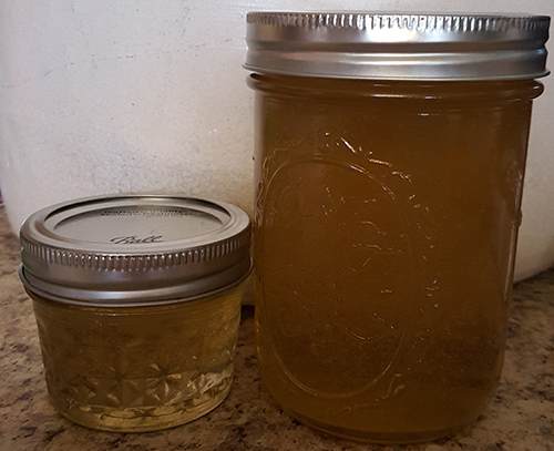 dandelion jelly in sealed jars