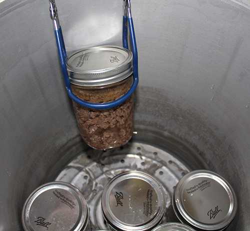Loading Ground Beef into Pressure Canner