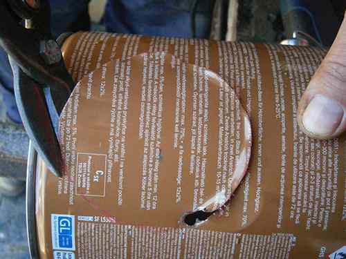cutting the tin can
