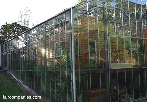 Couple Builds Greenhouse Around Home to Stay Warm and Grow Food All Year Long2