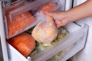 Why You Should Put A Coin In A Cup Of Frozen Water In Your Freezer